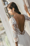 Open back lace wedding dress with floral sleeves, elegant modern bridal style Australia