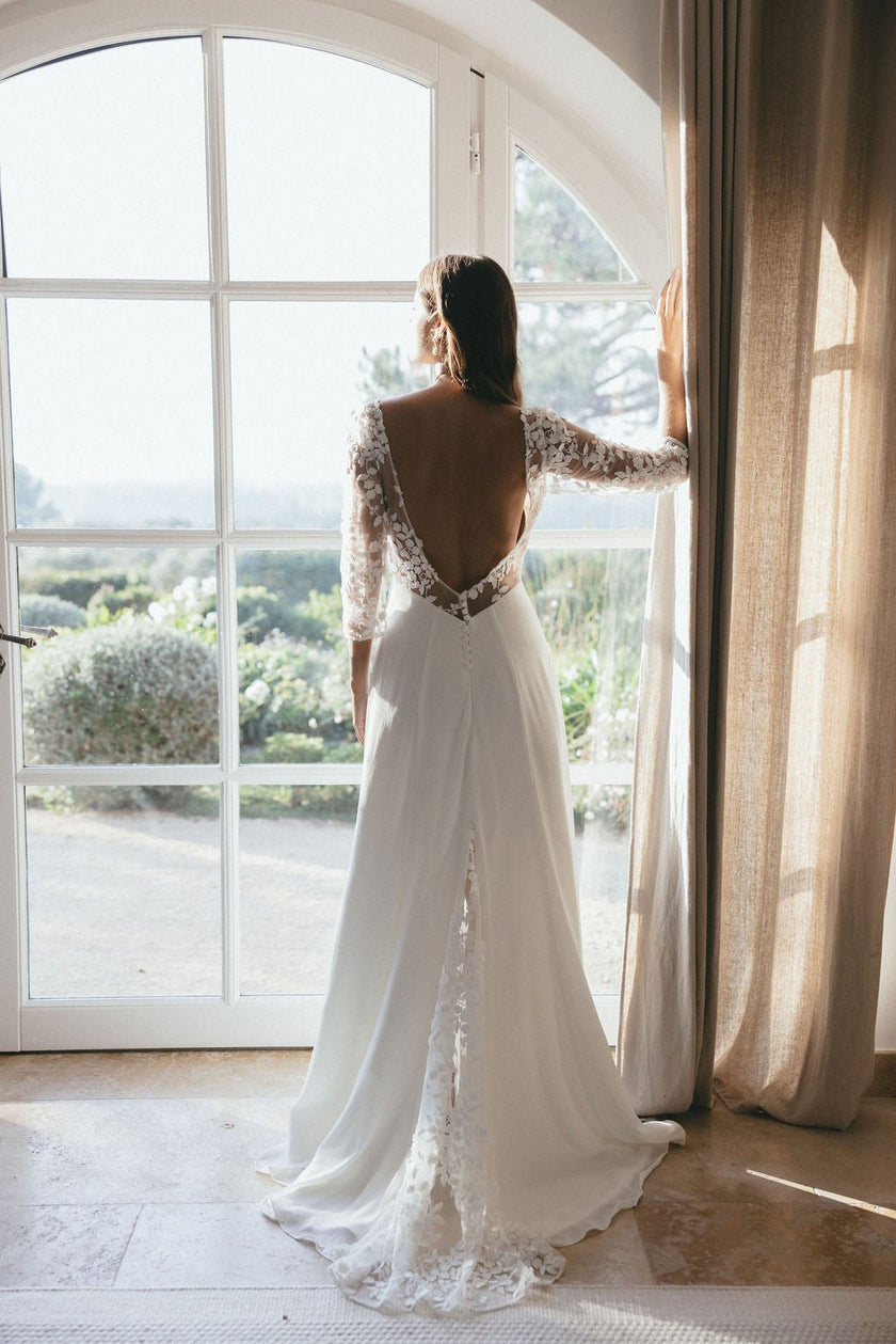Minimal bridal dress with soft flow, modern wedding style Australia